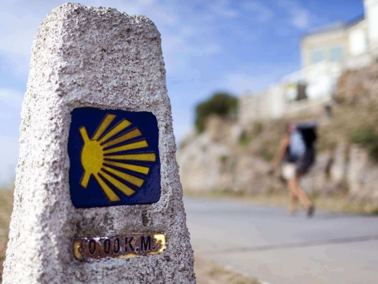 Trail marker on a pilgrimage on the Camino de Santiago with Wonder Voyage.