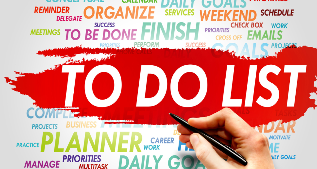 Image of hand with words to do list for complete mission trip planning guide