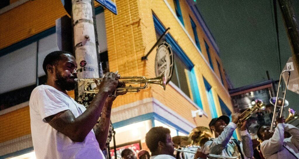 How A School Trip To New Orleans Can Change Your Perspective buss on canal street in New Orleans
