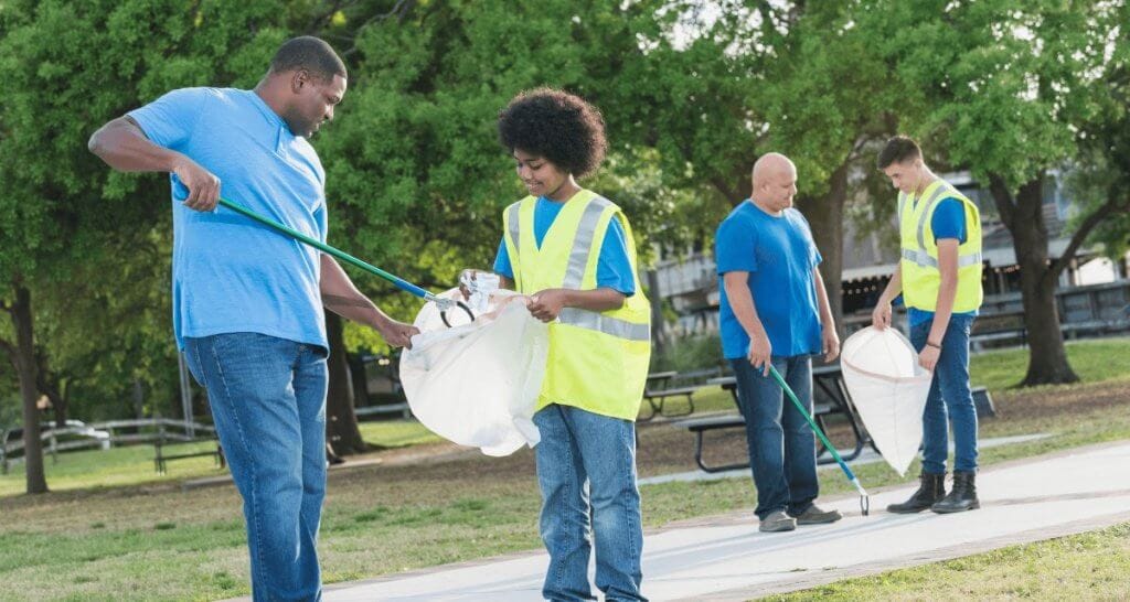 Service Trips for Volunteer Groups People serving at a soup kitchen image for Wonder Voyage blog