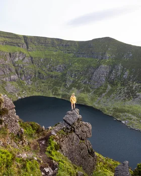 Woman hiking Coumshingaun for Wonder Voyage blog post about Ireland pilgrimage tour