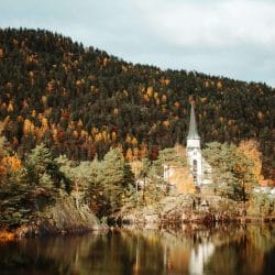 church on a lake in norway
