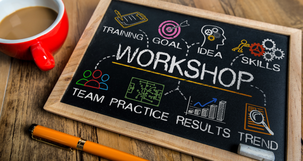 workshop written on chalkboard for blog post about hosting a pilgrimage speaker